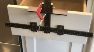Clamp Cabinet Jig in Place to Install Cabinet Pulls